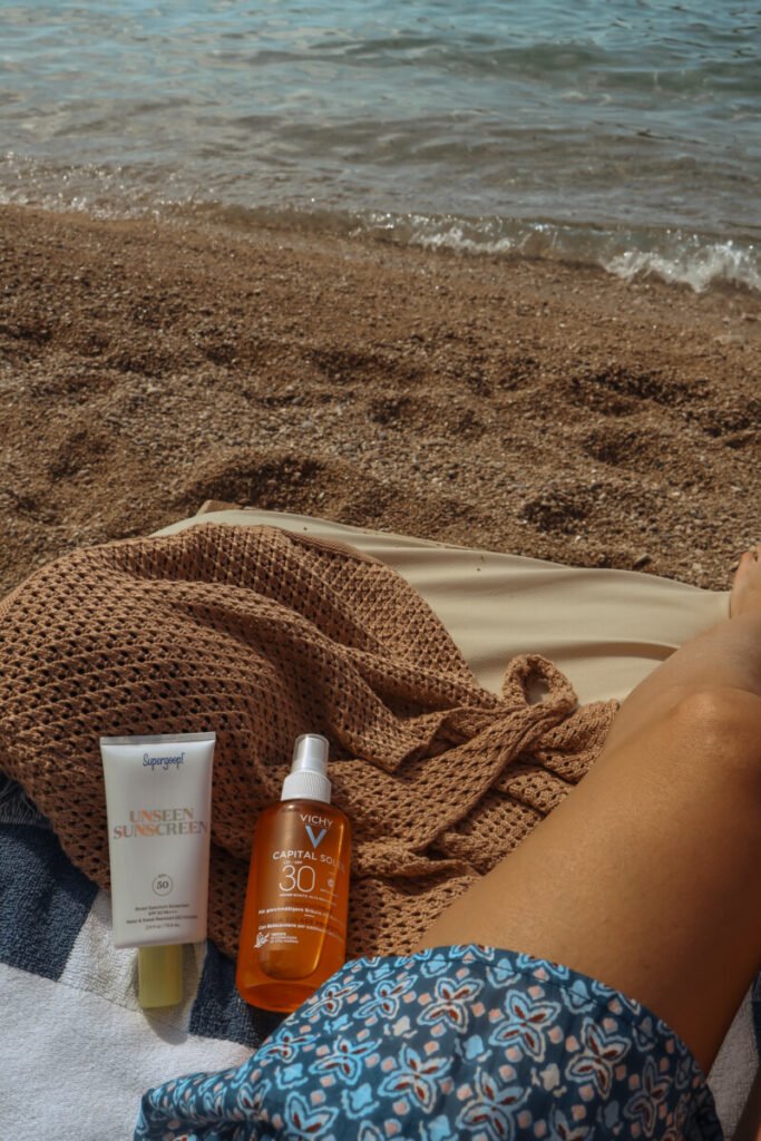 tanning lotion and sunbathing on the beach in croatia